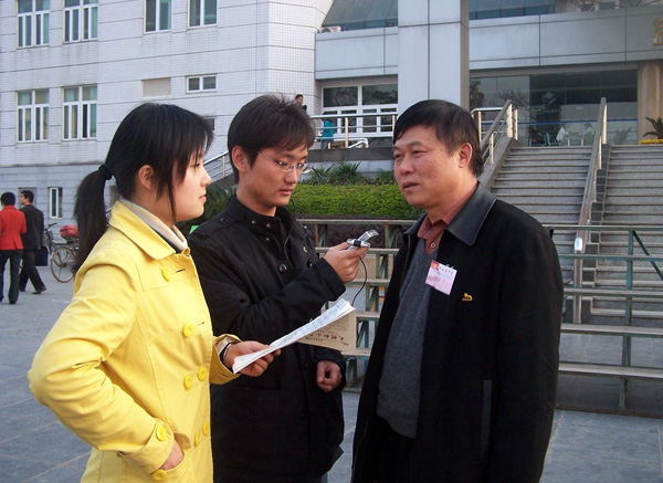 采访党代表王建周。